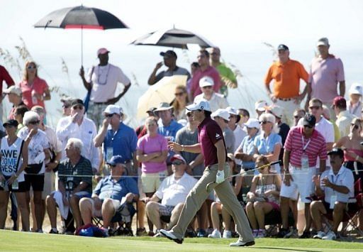 Rory McIlroy of Northern Ireland waves to the crowd